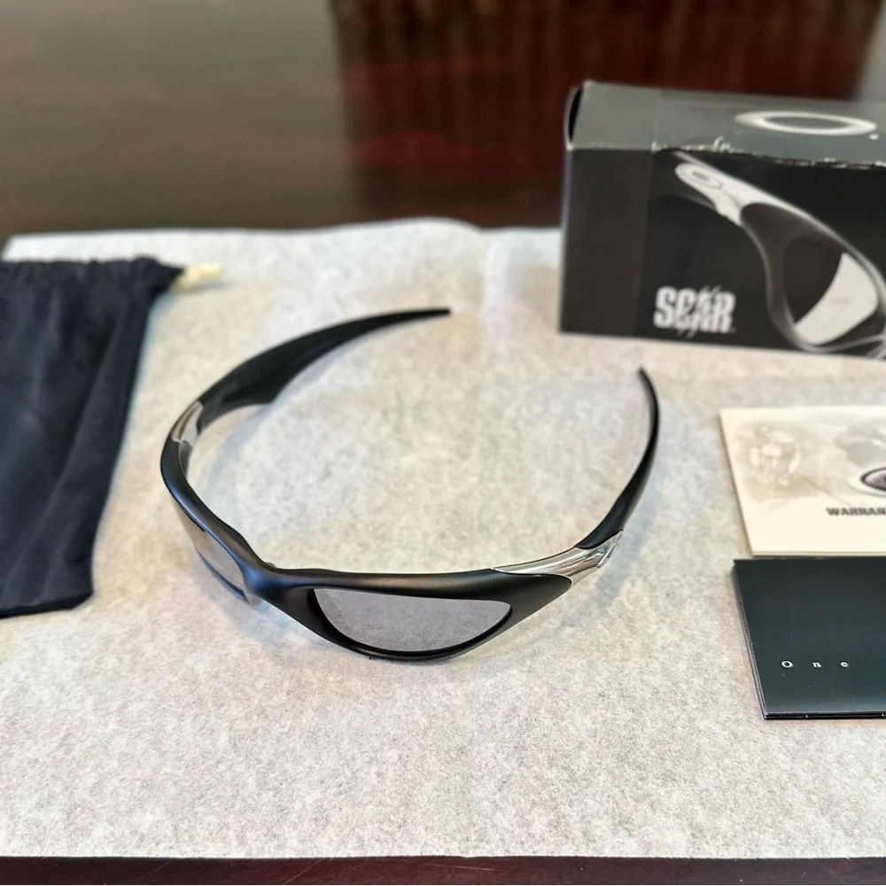 Oakley Scar Sunglasses in black with black lenses